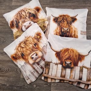 Cushion Covers, a set of four differing covers with adorable Highland Cows
